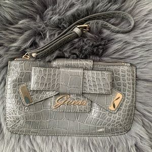 👛 GUESS SNAKESKIN BOW CLUTCH